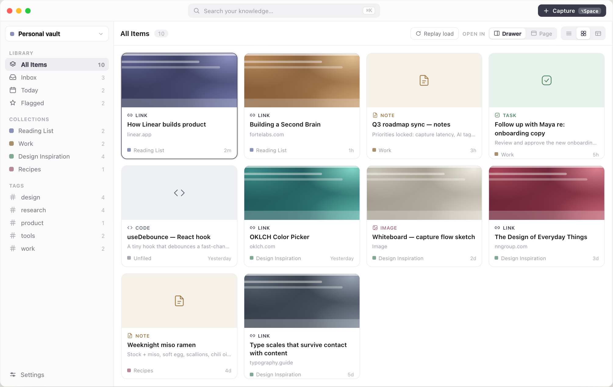 Card view: saved items as a grid of cards with previews, grouped under the sidebar's collections.
